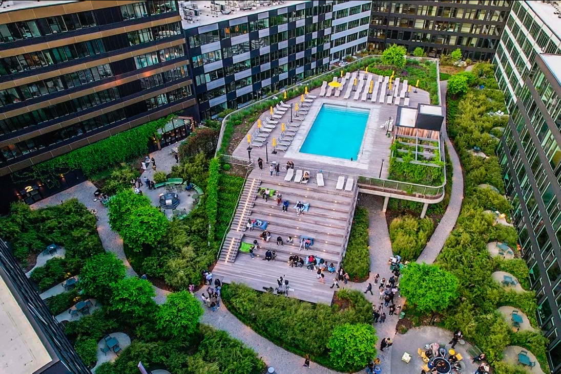 View of the courtyard and elevated swimming pool at Stamford Urby - luxury Stamford CT apartments for rent
